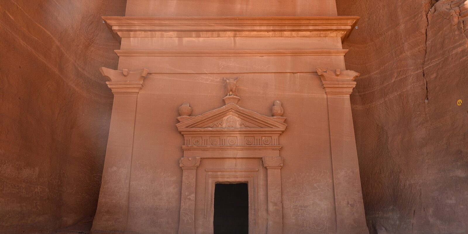 Is Hegra worth visiting — panorama of Nabataean tombs at Hegra in AlUla