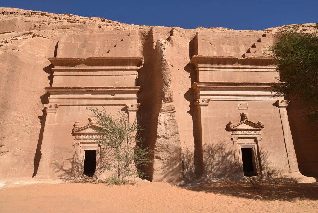 Nabataean rock-cut tombs carved into sandstone at Hegra, AlUla
